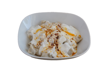 manti with yoghurt, traditional Turkish food, isolated