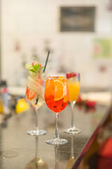 Summer citrus and fruit drinks in glass glasses