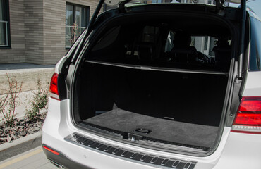 An open trunk is typical of a new car. Close-up