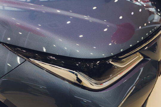 Detail of a beauty and fast car with headlight.