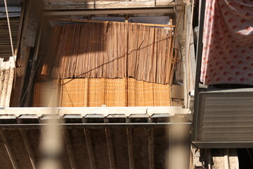 Sukkah for Sukkot from wooden sides and sheets on the street