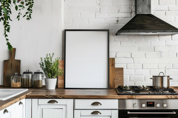 Modern Scandinavian kitchen with white brick wall and wooden counters. An empty frame for wall art mock up