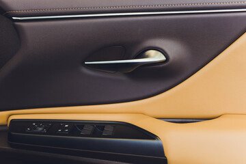 Car interior - front door view close-up modern.