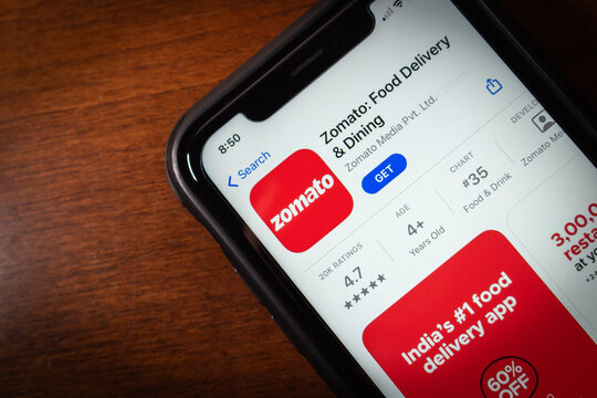 Vancouver, CANADA - Mar 4 2024 : Zomato app seen in App Store on iPhone screen. Zomato is an Indian multinational restaurant aggregator and food delivery company. Zomato was founded in 2008