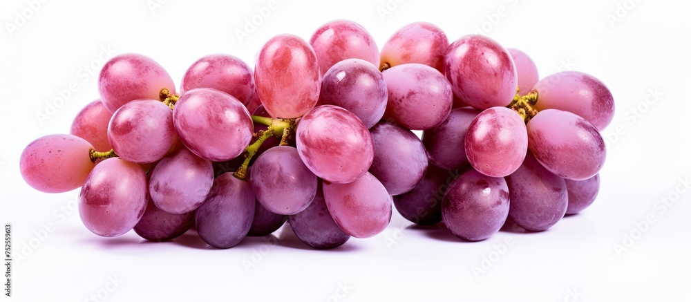 Poster a collection of grapes stacked on top of each other, showcasing their vibrant colors and round shape
