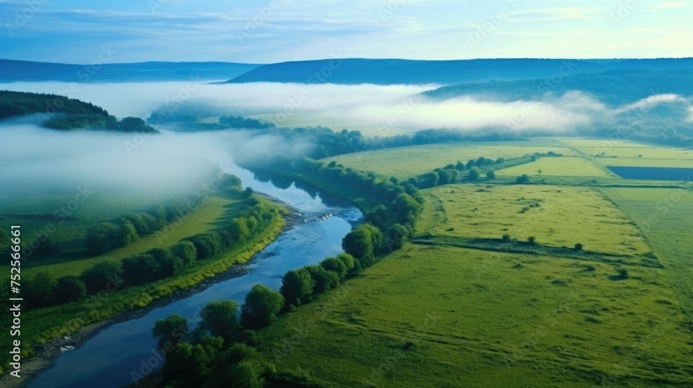 Poster a scenic view of a river running through a vibrant green field. suitable for nature and landscape th