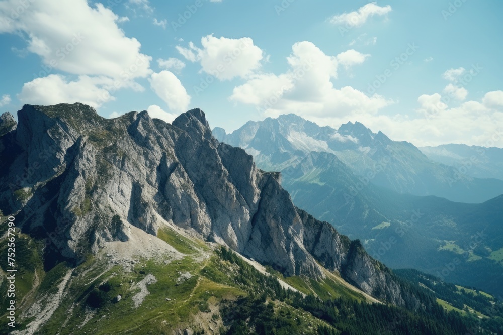 Aufkleber a stunning view of a mountain range from the top of a mountain. ideal for travel and adventure conce