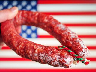 American Cuisine Concept with Smoked Sausage and Flag