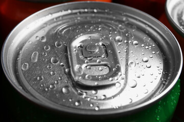 Energy drink in wet can, closeup. Functional beverage