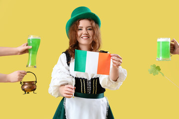 Young Irish waitress and hands with Irish symbols on yellow background. St. Patrick's Day...
