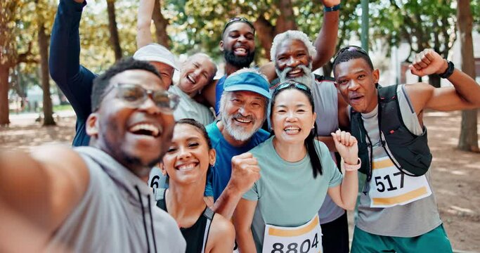 Group of people, smile or selfie of fitness, winning, fist pump for success in exercise or marathon. Excited, runners or friends for hand up to celebrate, victory or competition in park in Canada