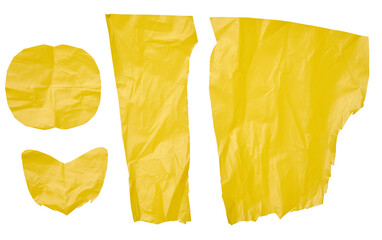 Various yellow polyethylene pieces on isolated background