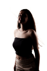 Naklejka premium Half silhouette poirtrait of a beautiful girl with long hair isolated on white background.