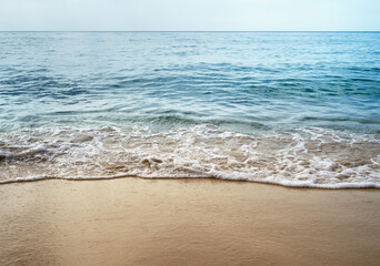 Ocean wave on sandy beach background - 752608035