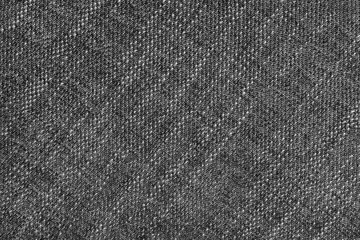 Coarse weave jacquard fabric texture background, black cloth texture. Textile background, furniture...