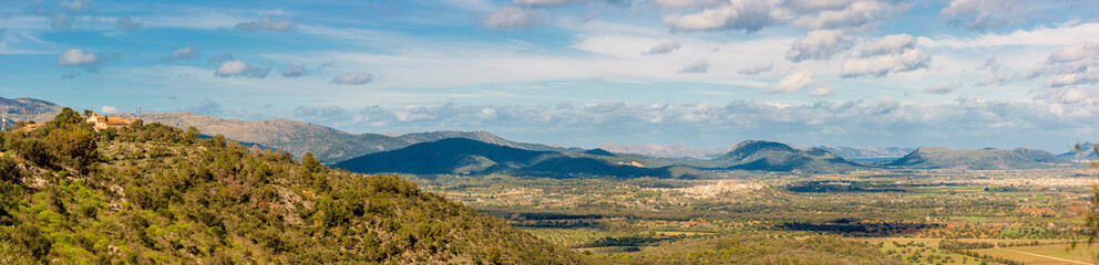 Fototapeta na wymiar Panoramic View of San Salvador Peak and Tramuntana Range in Mallorca