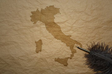 map of italy on a old paper background with old pen