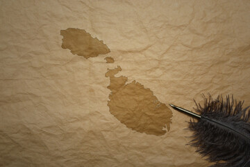 map of malta on a old paper background with old pen