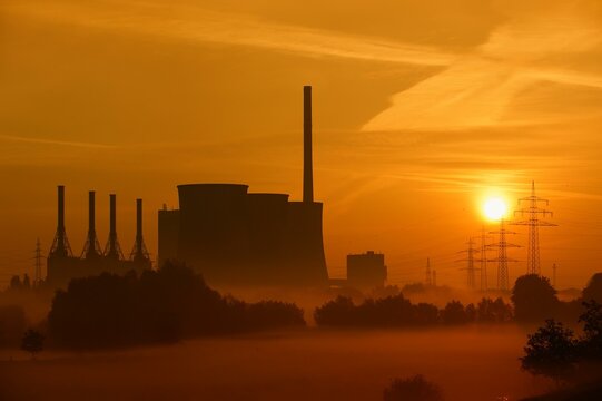 Gersteinwerk power station and high-voltage pylons at sunrise, Werne-Stockum, North Rhine-Westphalia, Germany, Europe