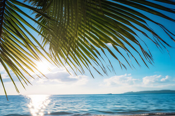 Fototapeta premium Tropical Beach Paradise with Palm Frond Silhouette Against a Sparkling Ocean Sunset Scene Background. Summer Vacation and Nature Travel Adventure Concept