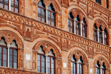 Fototapeta premium Close-up of a historic facade in the center of Pisa, in Tuscany, central Italy