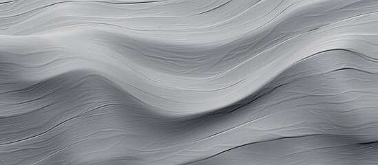 This close-up view showcases a multilayered gray textured background with captivating waves that create a dynamic visual effect. The surface appears to undulate and ripple, adding depth and complexity