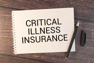 Notepad with text CRITICAL ILLNESS INSURANCE. Diagram and white background
