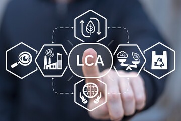 Man using virtual touch screen presses abbreviation: LCA. Life Cycle Assessment ( LCA ) concept. ISO LCA standard aims to limit climate change.