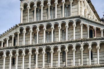 Fototapeta na wymiar Pisa Cathedral, medieval Roman Catholic cathedral dedicated to the Assumption of the Virgin Mary, in the Piazza dei Miracoli in Pisa, Italy