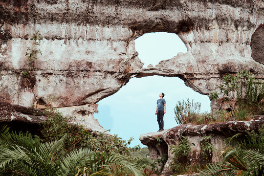 person in a cave