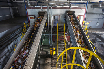 moving conveyor transporter on Modern waste recycling processing plant. Separate and sorting...