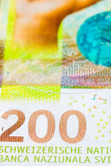 CHF money banknotes, detail photo of swiss franc