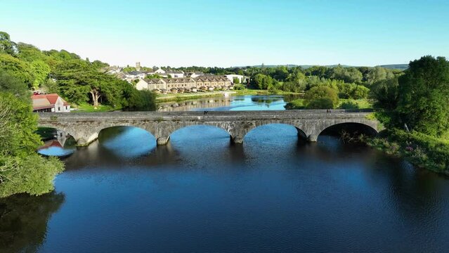 A beautiful bridge against the cottage community in 4k