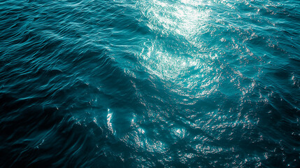 Blue green surface of the ocean in Catalina Island California with gentle ripples on the surface and light refracting. - obrazy, fototapety, plakaty