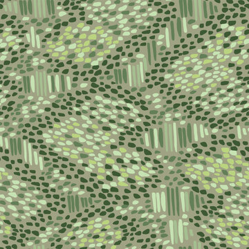 Abstract animal snake skin seamless repeat pattern camouflage made with oblong camo shapes, spots, brush marks in tonal khaki greens