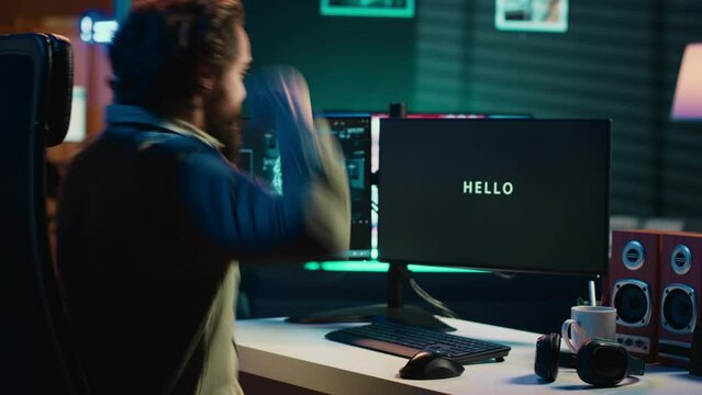 Happy programmer celebrating after managing to make AI become sentient and ask questions about itself. Ecstatic developer punching desk in excitement after achieving AI singularity, camera A