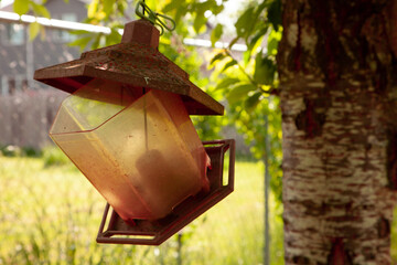 Rusted bird feeder