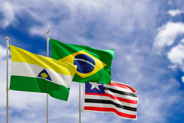 Official flags of the country Brazil, state of Maranhao and city of Imperatriz. Swaying in the wind under the blue sky. 3d rendering