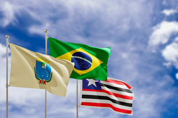 Official flags of the country Brazil, state of Maranhao and city of Sao Luiz. Swaying in the wind under the blue sky. 3d rendering