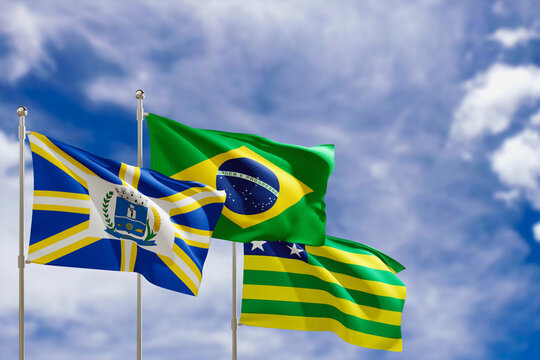 Official flags of the country Brazil, state of Goias and city of Anapolis. Swaying in the wind under the blue sky. 3d rendering