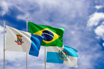 Official flags of the country Brazil, state of Rio de Janeiro and city of Niteroi. Swaying in the wind under the blue sky. 3d rendering