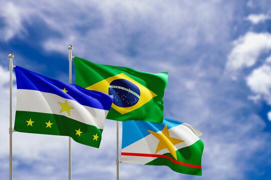 Official flags of the country Brazil, state of Roraima and city of Rorainopolis. Swaying in the wind under the blue sky. 3d rendering