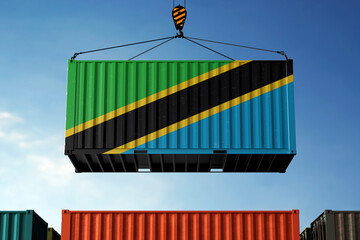 Tanzania trade cargo container hanging against clouds background - obrazy, fototapety, plakaty