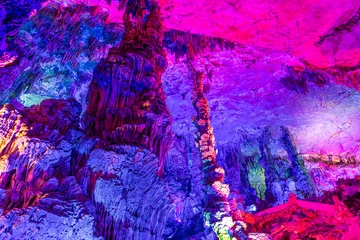 Papier Peint photo autocollant Guilin A natural cave in Guilin, China beautifully decorated with colorful lights
