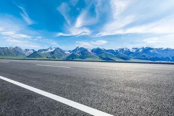 Fototapeten Asphalt highway road and green mountain nature landscape under blue sky © ABCDstock