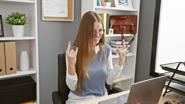 Rockin' the office, blonde business bombshell unleashes inner heavy metal star, expressive hands flashing rock symbol in workplace fun