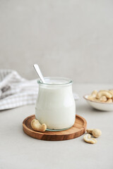 Cashew sour cream in glass jar