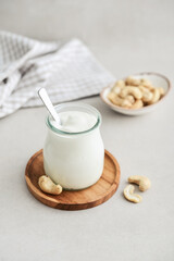 Cashew sour cream in glass jar