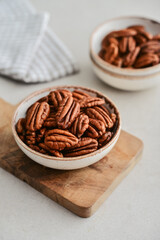 Pecan nuts in bowls