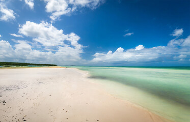 Beautiful tropical beach with white sand, turquoise water and blue sky